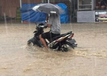 Kondisi air tergenang di Jalan HM Ardan, Kelurahan Satimpo. (Dok: Istagram @cicitasik89)
