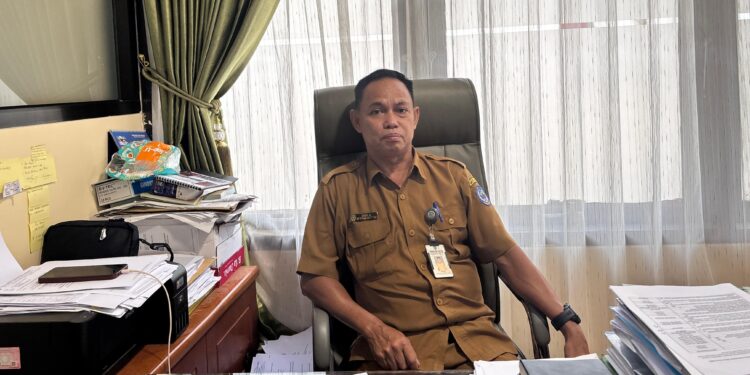 Penata Perizinan Ahli Muda, DPMPTSP Bontang, Idrus.