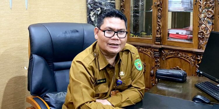 Kepala Dinsos Kutim, Ernata Hadi Sujito