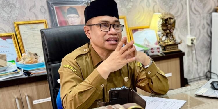Kepala DPPKB Kutim, Achmad Junaidi,