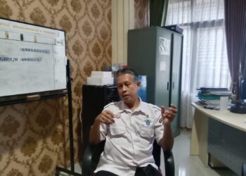 Pejabat Fungsional Ahli Madya Analis Kebijakan Bidang Penanaman Modal DPMPTS, Karel, (Dok/Cuitan).