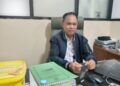 Penata Perizinan Ahli Muda DPMPTSP Bontang, Idrus,