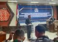 Anggota DPRD Bontang Rustam saat membaca hasil temuan BPK saat rapat paripurna