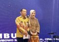Kapolres baru Bontang AKBP Anak Agung Gede Wibowo Sitepu bersama istrinya